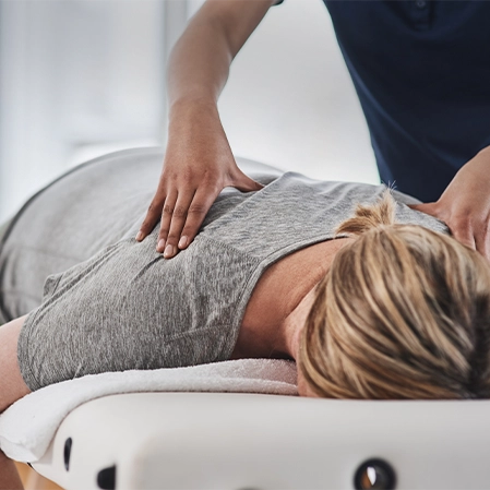 Chronic Pain Columbia TN Woman Receiving Adjustment